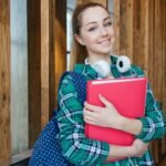 student-with-book-home